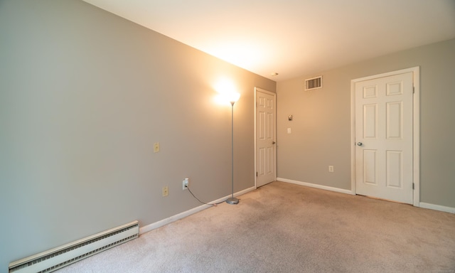 19 Heather Ct Unit 19, Cromwell, CT 06416 - unfurnished room featuring a baseboard radiator and light carpet