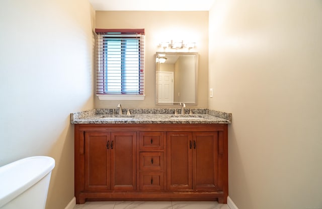 19 Heather Ct Unit 19, Cromwell, CT 06416 - bathroom with baseboards and double vanity