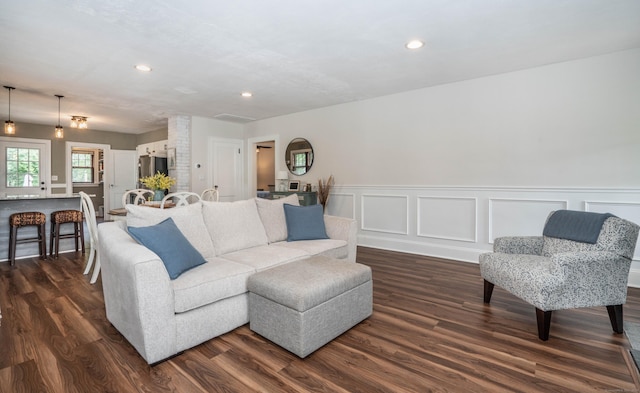 67 Nott St, Wethersfield, CT 06109 - living area with dark wood-style flooring, a wainscoted wall, and recessed lighting