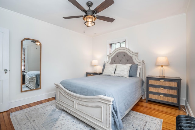 67 Nott St, Wethersfield, CT 06109 - bedroom with wood finished floors, crown molding, and a ceiling fan