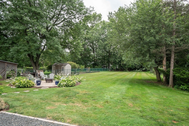 67 Nott St, Wethersfield, CT 06109 - view of yard with an outdoor fire pit