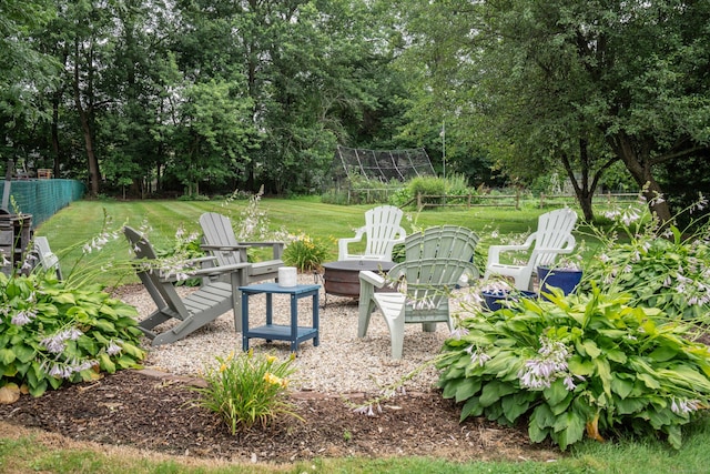 67 Nott St, Wethersfield, CT 06109 - view of yard with a fire pit and view of scattered trees