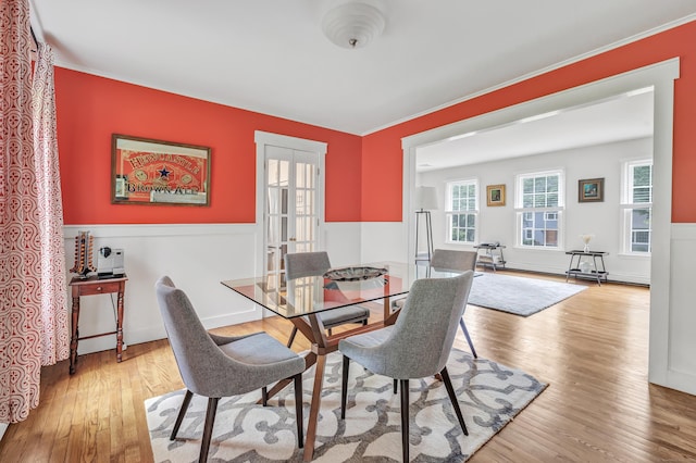 31 Stable Ridge Rd, Monroe, CT 06468 - dining room with wood finished floors, a baseboard heating unit, and ornamental molding