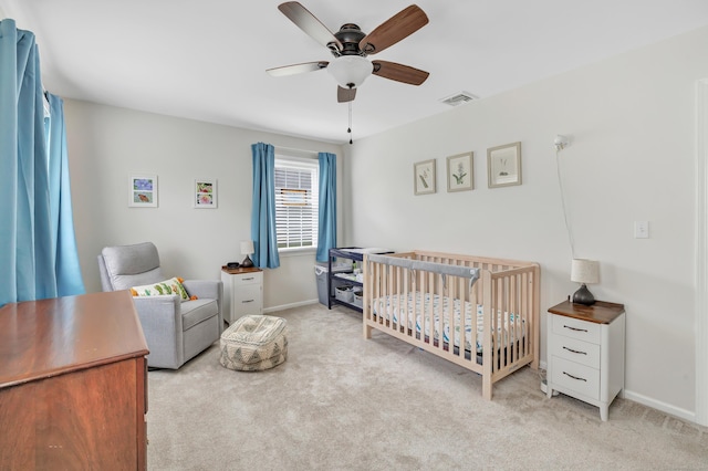 31 Stable Ridge Rd, Monroe, CT 06468 - bedroom with light carpet, a crib, and ceiling fan