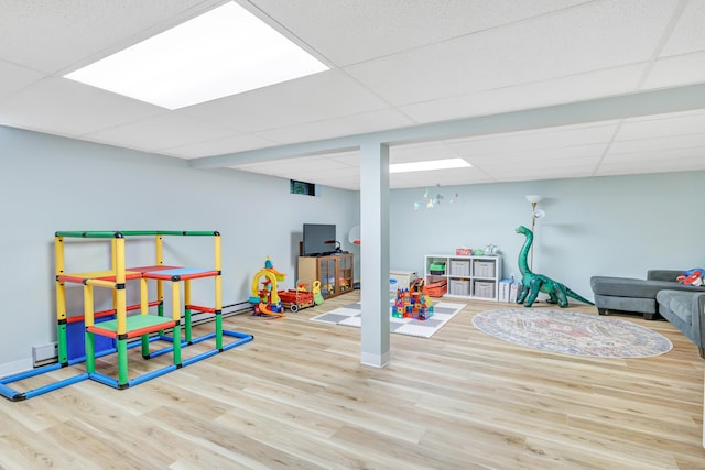 31 Stable Ridge Rd, Monroe, CT 06468 - playroom featuring a paneled ceiling and wood finished floors