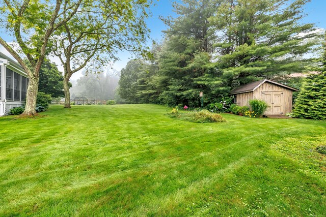 31 Stable Ridge Rd, Monroe, CT 06468 - view of green lawn with a storage shed