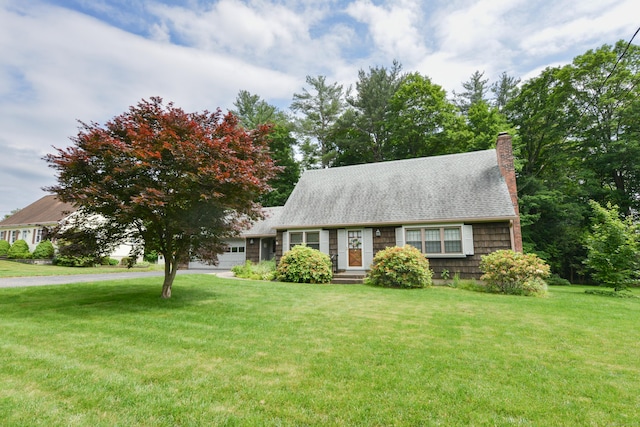 110 Woodfield Rd, Bristol, CT 06010 - view of front of property with a front lawn, a chimney, and driveway