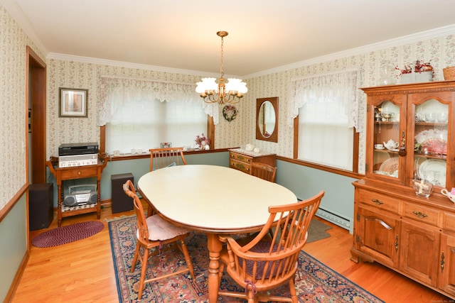 110 Woodfield Rd, Bristol, CT 06010 - dining room featuring wallpapered walls, light wood-style floors, crown molding, a chandelier, and a baseboard heating unit