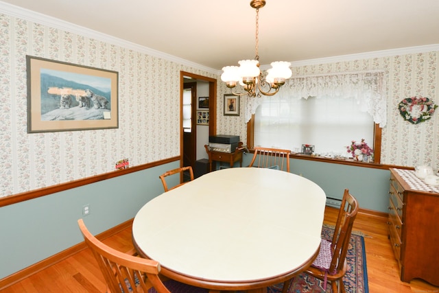 110 Woodfield Rd, Bristol, CT 06010 - dining room with wood finished floors, a chandelier, crown molding, wallpapered walls, and radiator