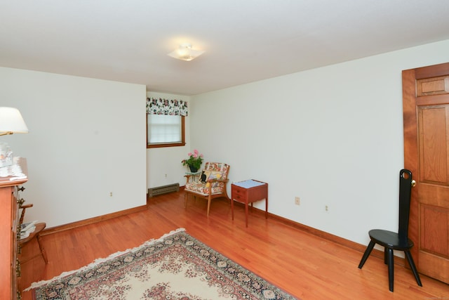 110 Woodfield Rd, Bristol, CT 06010 - living area with light wood-style floors and baseboards