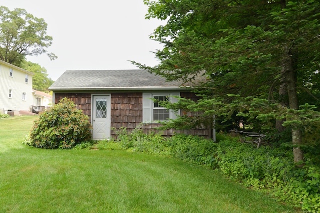 110 Woodfield Rd, Bristol, CT 06010 - back of property with a shingled roof and a lawn