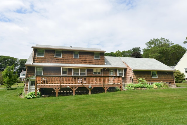 110 Woodfield Rd, Bristol, CT 06010 - rear view of house featuring a lawn