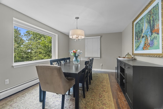 109 Hemlock Dr, Killingworth, CT 06419 - dining room featuring a baseboard heating unit, a chandelier, and dark wood-type flooring
