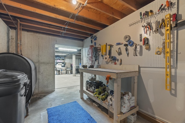 109 Hemlock Dr, Killingworth, CT 06419 - unfinished below grade area featuring a workshop area and heating fuel