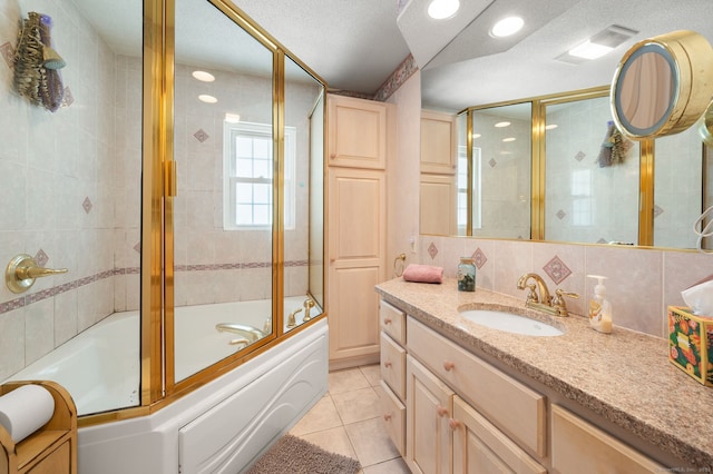 43 Dimmock Rd, Waterford, CT 06385 - full bathroom with tile patterned floors, vanity, enclosed tub / shower combo, a textured ceiling, and recessed lighting