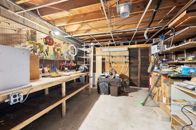 43 Dimmock Rd, Waterford, CT 06385 - unfinished basement with a workshop area