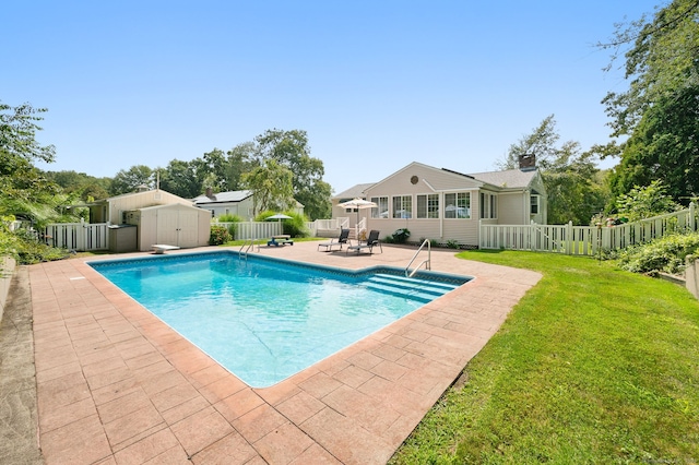 43 Dimmock Rd, Waterford, CT 06385 - view of swimming pool featuring a shed, a patio, a fenced backyard, and a diving board