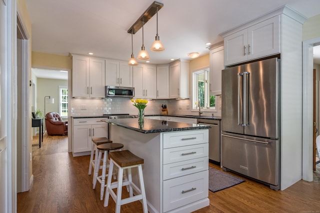 10 Oak Dr, Essex, CT 06409 - kitchen featuring stainless steel appliances, dark wood-style flooring, white cabinets, and recessed lighting