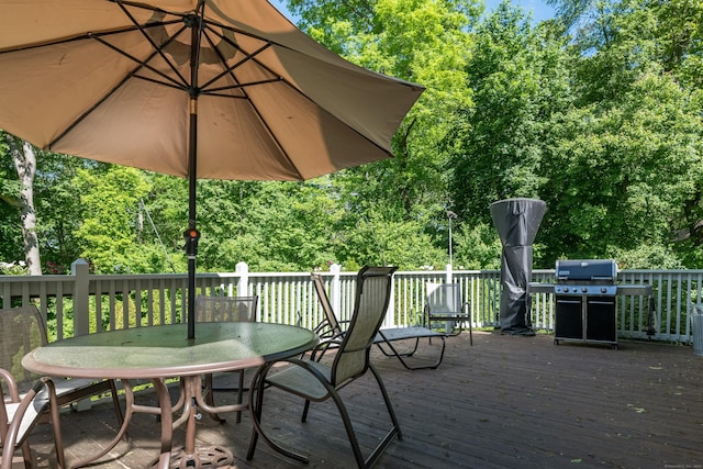 10 Oak Dr, Essex, CT 06409 - wooden deck with outdoor dining space and grilling area