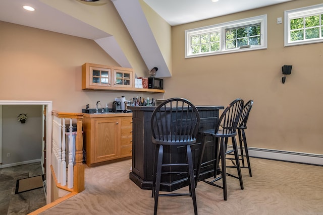 10 Oak Dr, Essex, CT 06409 - indoor wet bar featuring plenty of natural light, light colored carpet, baseboard heating, and recessed lighting