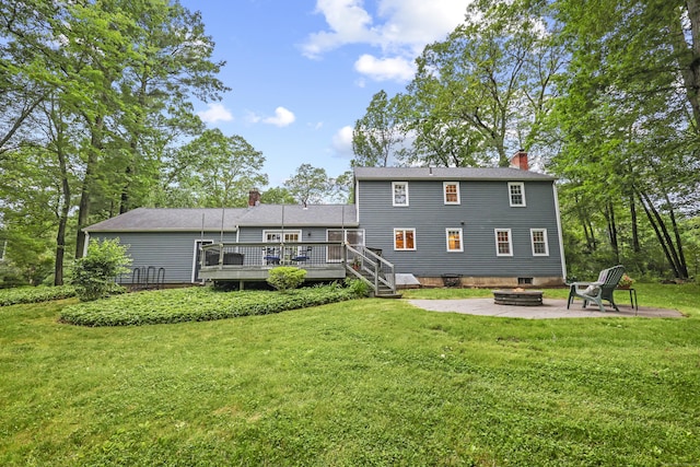 30 Clifdon Dr, Simsbury, CT 06070 - back of house featuring an outdoor fire pit, a deck, a patio, and a yard