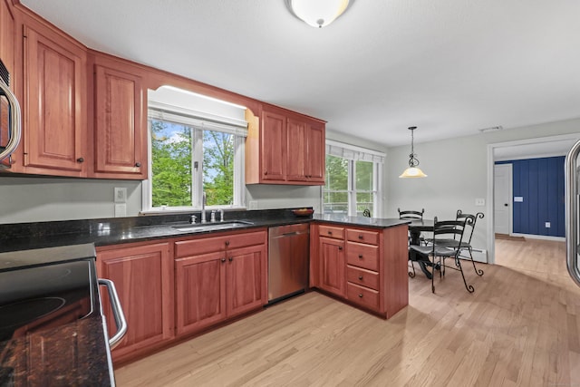 30 Clifdon Dr, Simsbury, CT 06070 - kitchen featuring dishwasher, light wood-type flooring, range, pendant lighting, and brown cabinetry