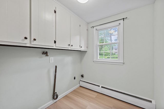 30 Clifdon Dr, Simsbury, CT 06070 - washroom featuring a baseboard heating unit, cabinet space, light wood-style floors, and hookup for a washing machine