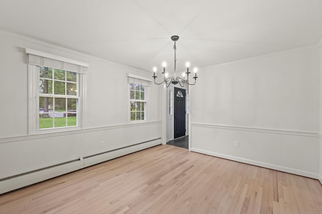 30 Clifdon Dr, Simsbury, CT 06070 - spare room featuring a baseboard radiator, a chandelier, wood finished floors, and crown molding