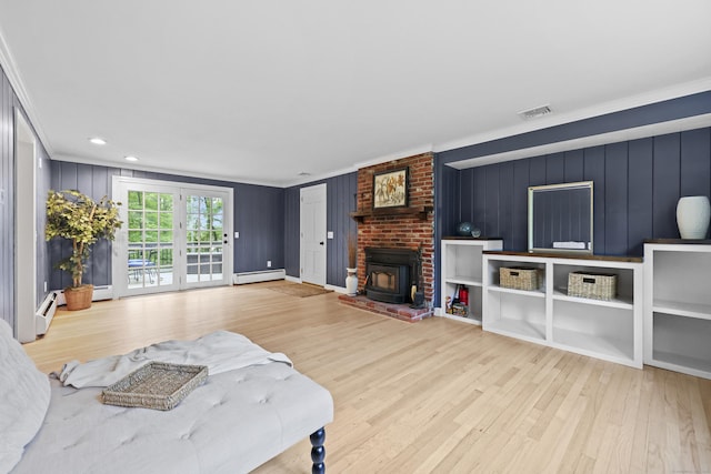 30 Clifdon Dr, Simsbury, CT 06070 - living area featuring ornamental molding, baseboard heating, wood finished floors, a baseboard heating unit, and a decorative wall