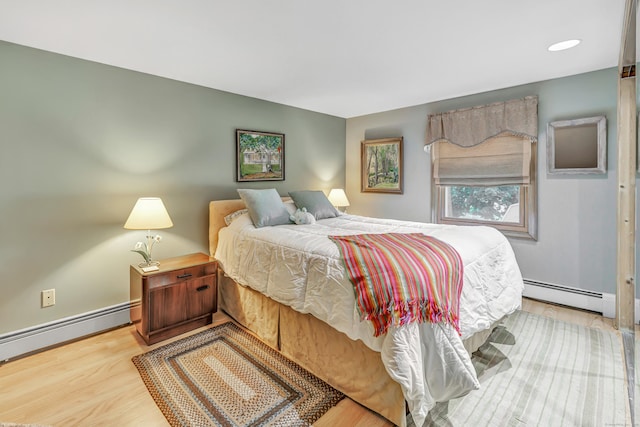 16 Senga Rd, Norwalk, CT 06854 - bedroom featuring a baseboard radiator and wood finished floors