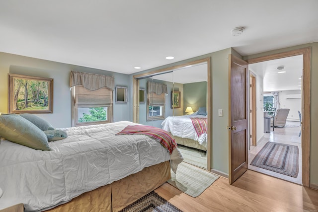 16 Senga Rd, Norwalk, CT 06854 - bedroom with light wood-type flooring, a closet, and recessed lighting