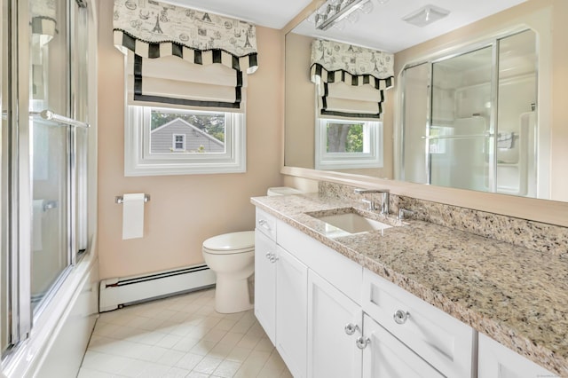 16 Senga Rd, Norwalk, CT 06854 - bathroom with a baseboard radiator, vanity, plenty of natural light, and tile patterned flooring