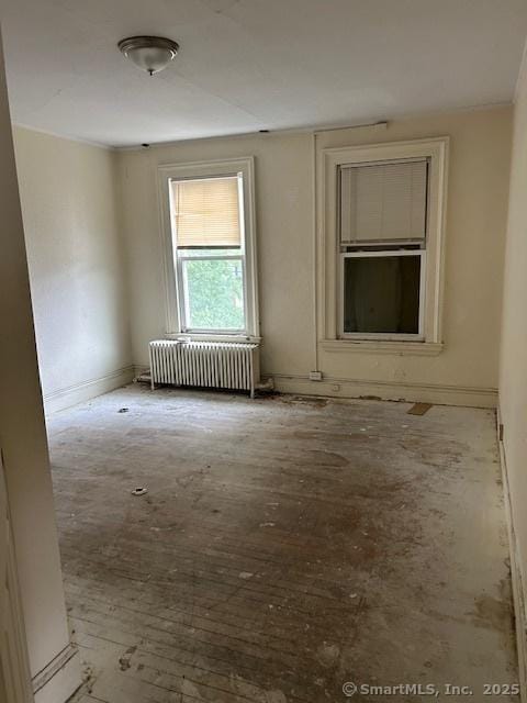 358 Orchard St, New Haven, CT 06511 - spare room featuring radiator heating unit and baseboards
