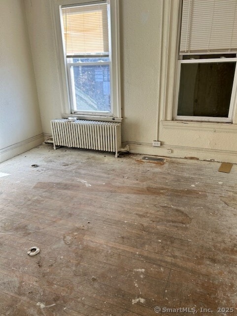 358 Orchard St, New Haven, CT 06511 - spare room featuring radiator heating unit and baseboards