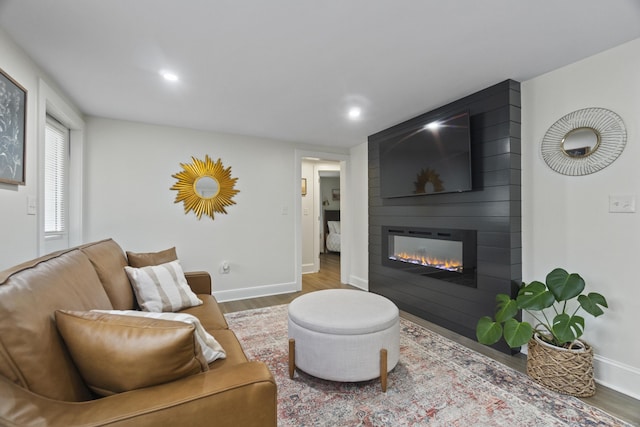 18 King St, Old Saybrook, CT 06475 - living room featuring wood finished floors, a fireplace, and recessed lighting