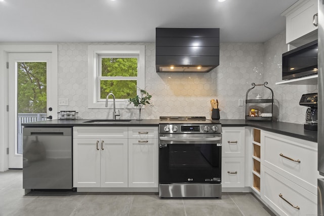 18 King St, Old Saybrook, CT 06475 - kitchen with stainless steel appliances, ventilation hood, dark countertops, tasteful backsplash, and healthy amount of natural light