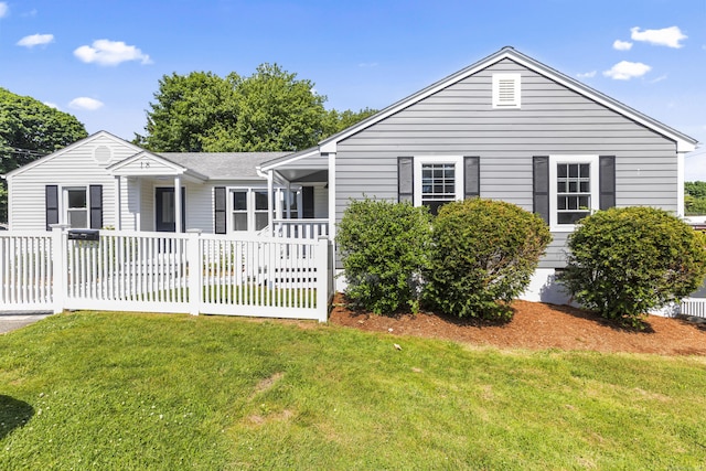 18 King St, Old Saybrook, CT 06475 - view of front of property with a front lawn, crawl space, and roof with shingles