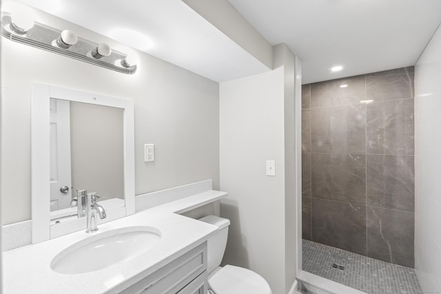 18 King St, Old Saybrook, CT 06475 - bathroom featuring vanity, tiled shower, and recessed lighting