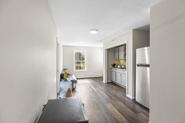 18 King St, Old Saybrook, CT 06475 - kitchen featuring freestanding refrigerator, a baseboard heating unit, and dark wood finished floors