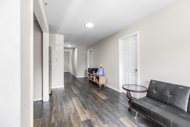 18 King St, Old Saybrook, CT 06475 - living area with dark wood-style flooring, recessed lighting, and a baseboard radiator