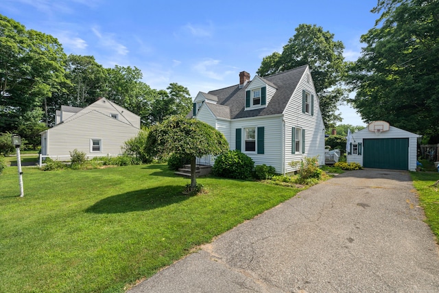 16 Lynde St, Old Saybrook, CT 06475 - cape cod-style house with an outbuilding, a chimney, a front lawn, a detached garage, and roof with shingles