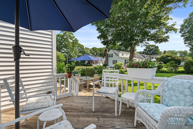 16 Lynde St, Old Saybrook, CT 06475 - wooden deck featuring outdoor dining space