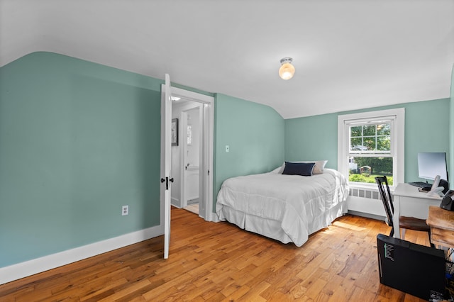 16 Lynde St, Old Saybrook, CT 06475 - bedroom featuring radiator, lofted ceiling, and light wood-style floors