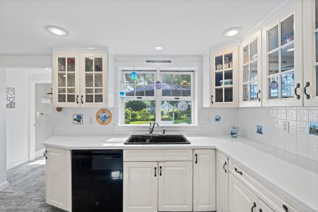 16 Lynde St, Old Saybrook, CT 06475 - kitchen featuring dishwasher, white cabinetry, tasteful backsplash, glass insert cabinets, and recessed lighting