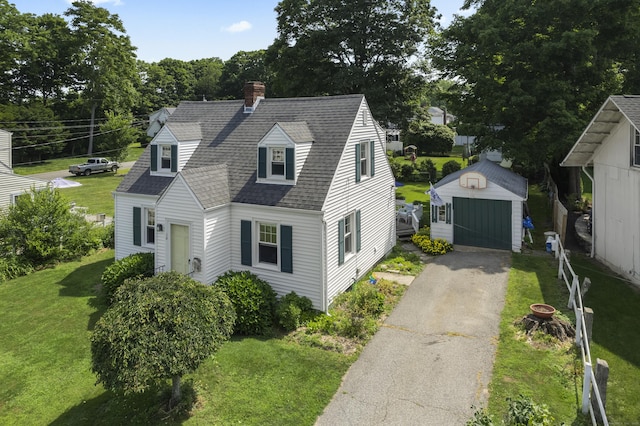 16 Lynde St, Old Saybrook, CT 06475 - cape cod house featuring an outbuilding, roof with shingles, a front yard, and a chimney