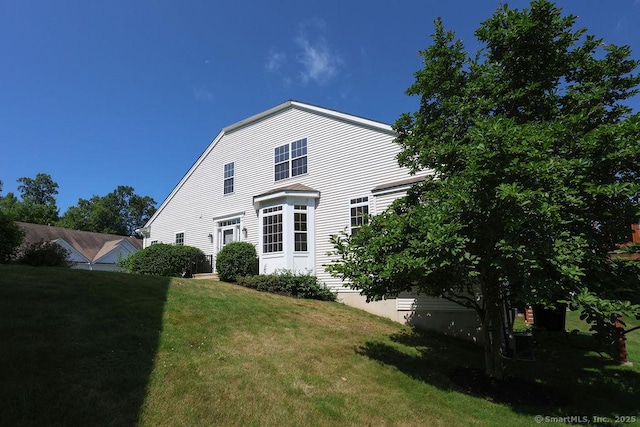 9 Meadowview Ct Unit 9, Canton, CT 06019 - back of house featuring a lawn