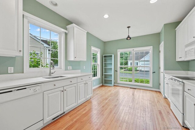 9 Meadowview Ct Unit 9, Canton, CT 06019 - kitchen with white appliances, white cabinetry, healthy amount of natural light, and recessed lighting