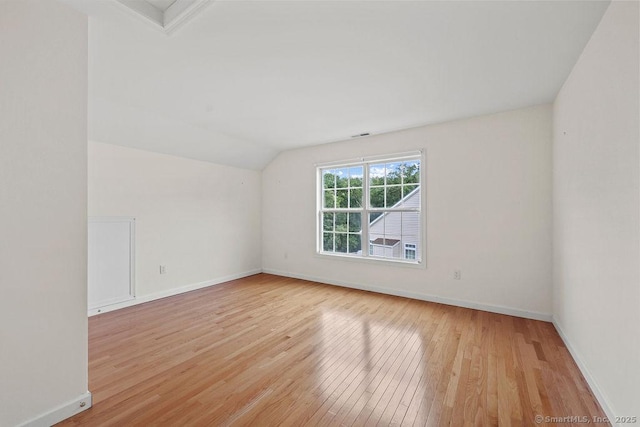 9 Meadowview Ct Unit 9, Canton, CT 06019 - spare room with light wood finished floors and vaulted ceiling