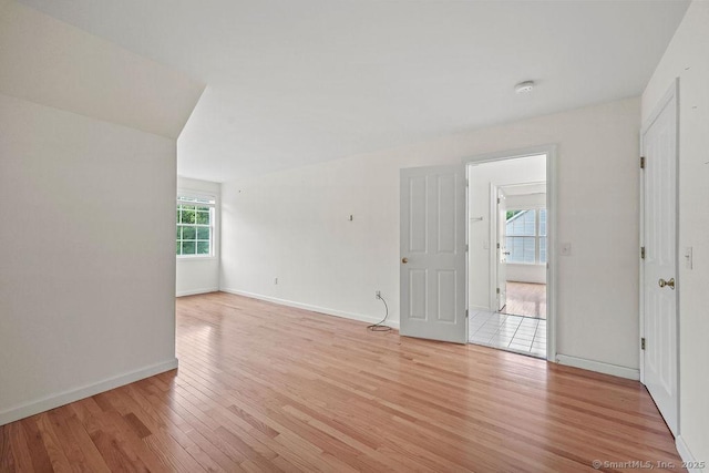 9 Meadowview Ct Unit 9, Canton, CT 06019 - unfurnished room with light wood-type flooring and baseboards