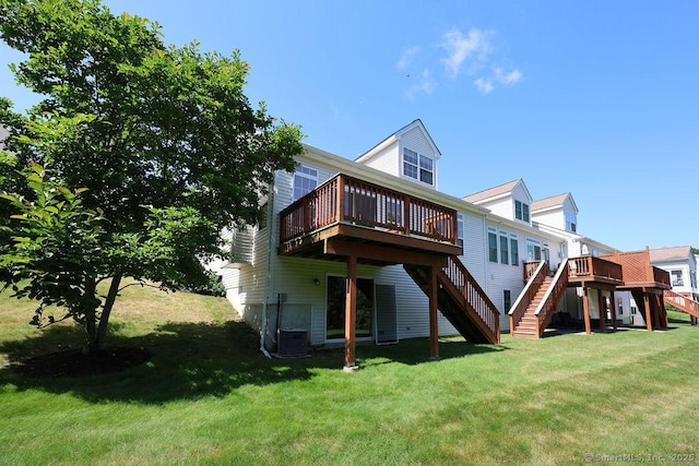 9 Meadowview Ct Unit 9, Canton, CT 06019 - rear view of house featuring stairs, a deck, and a lawn